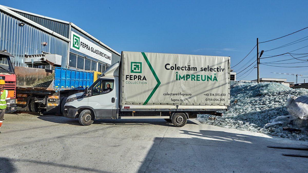 FEPRA Collection truck reading “Colectăm selectiv împreună”, in front of the FEPRA Glass Recycling hall
